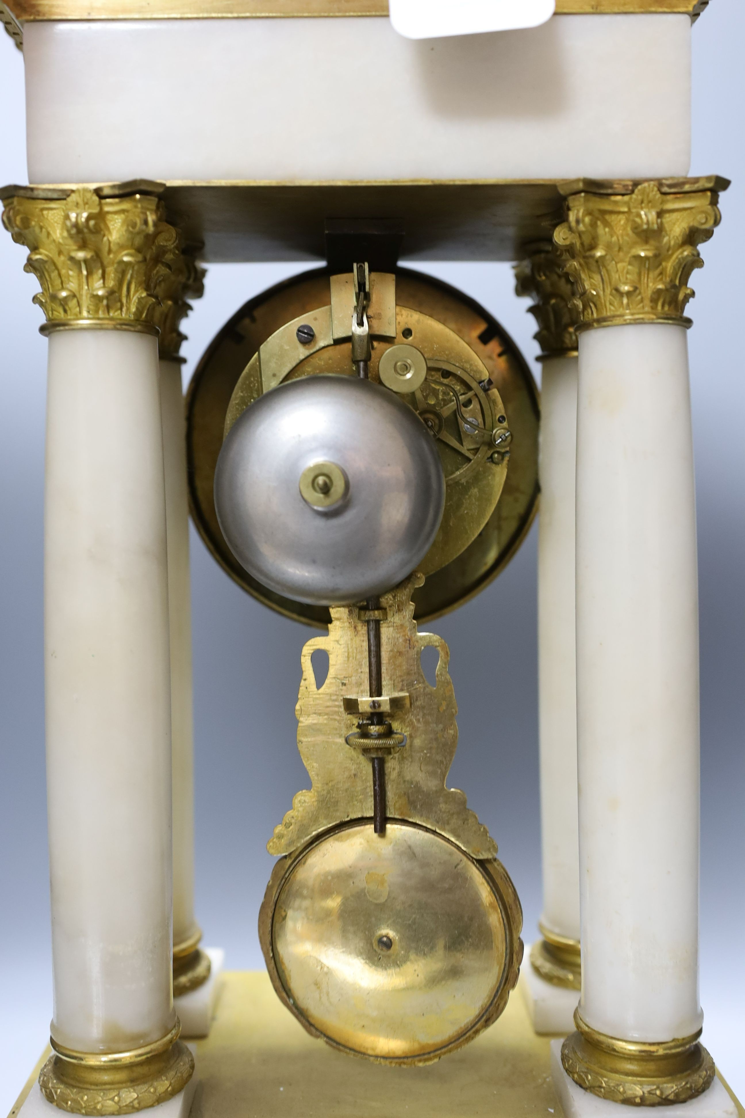 A 19th-century French ormolu and alabaster portico clock 53cm